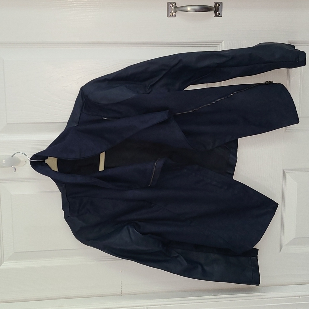 Moto jacket, faux leather and suede.